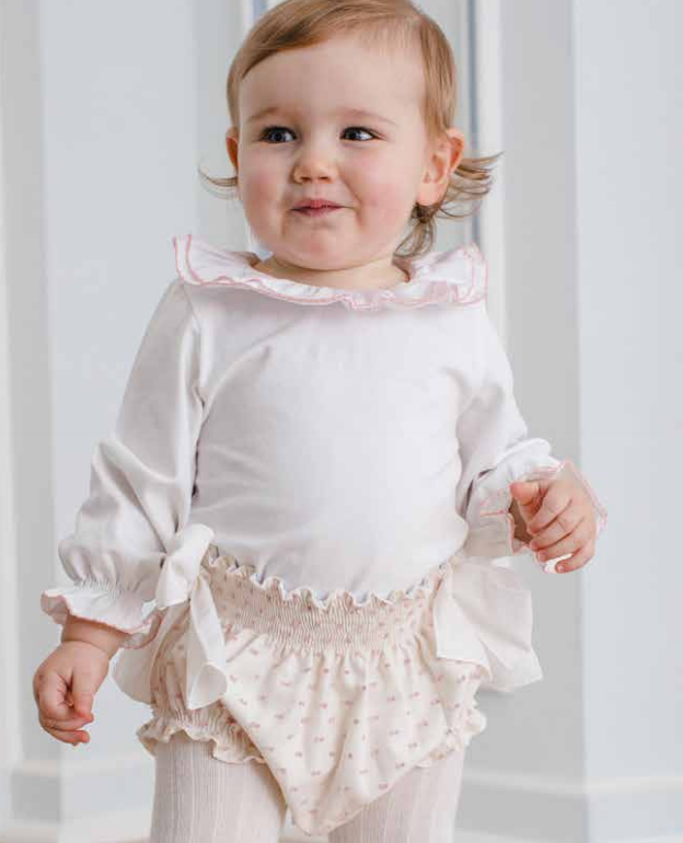 White Frilled vest with pink trim